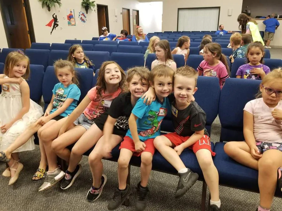Children seated together in the sanctuary during Faith’s 2023 Vacation Bible School.